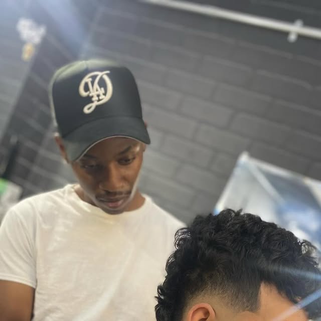 Barber at work in the chair